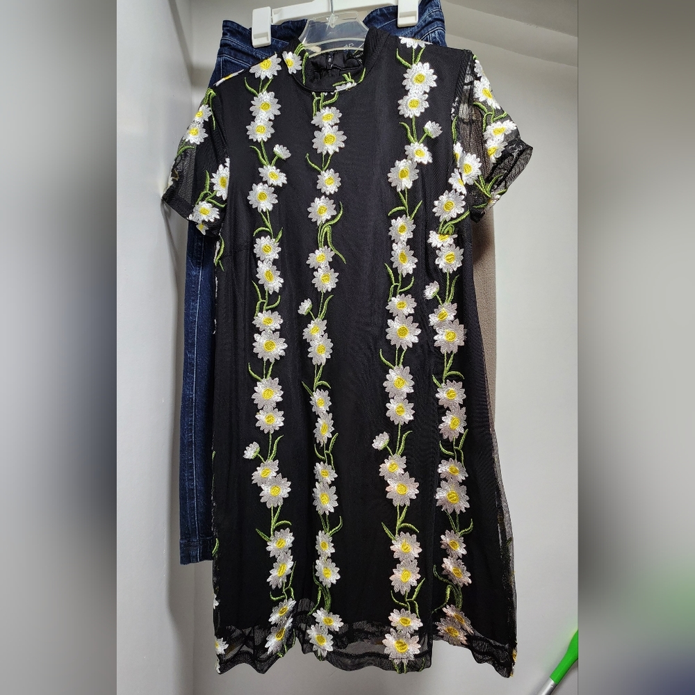 Black dress with daisy print